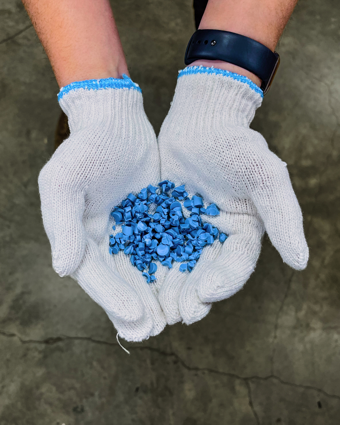 Hands holding Boie USA's recycled material made from body & face scrubbers